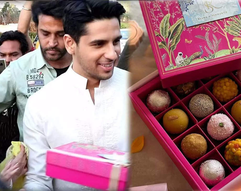 
Sidharth Malhotra-Kiara Advani distribute boxes of customised mithais to paparazzi. Here's an inside look
