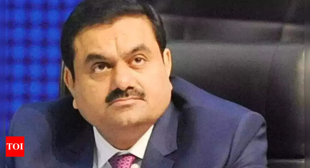 Volatility in group stocks is temporary, says Gautam Adani – Times of India