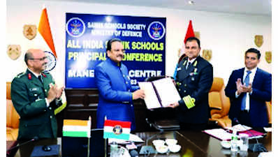 MoD felicitates Sainik School principal