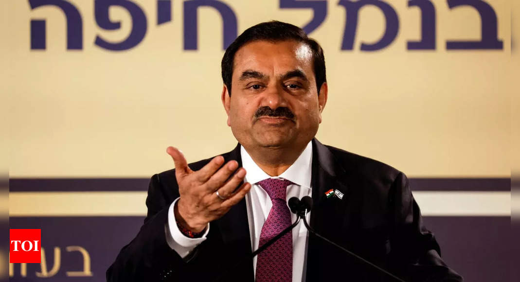 Adani credit flashes warnings after group gorged on cheap debt – Times of India