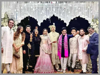Sidharth Malhotra and Kiara Advani smile eat-to-ear as they strike a pose with Manish Malhotra and his team – See photos