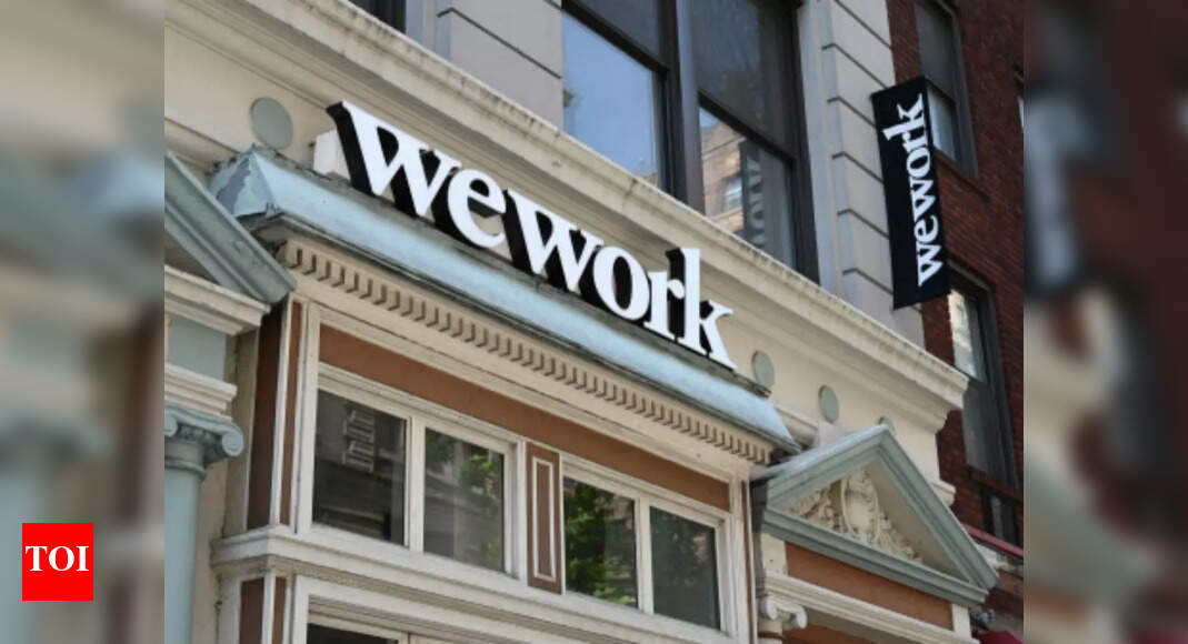 Wework WeWork issues glum revenue forecast as tech layoffs hurt