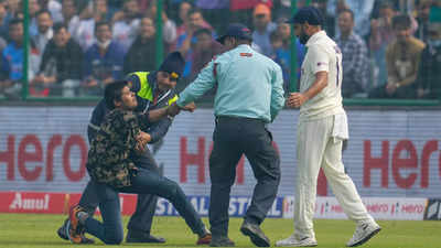 Watch: Mohammed Shami rescues pitch invader, wins hearts