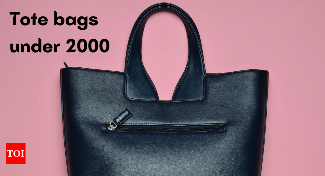 Black leather tote bag photo  Free Bag Image on Unsplash