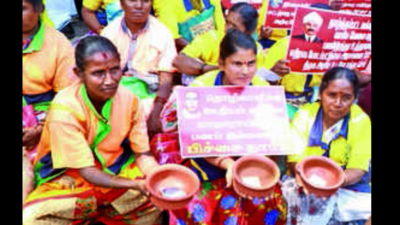 Coimbatore City Municipal Corporation conservancy workers stage begging bowl protest