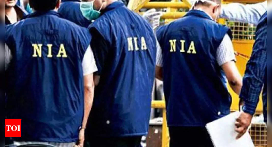 NIA conducts searches in 8 states in gangster network cases | India News – Times of India