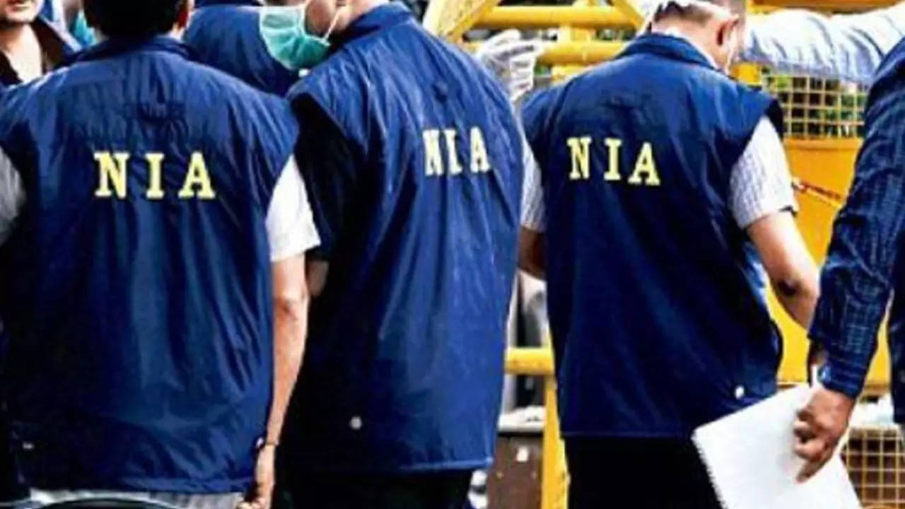 NIA Raids: NIA conducts searches in 8 states in gangster network cases | India News - Times of India
