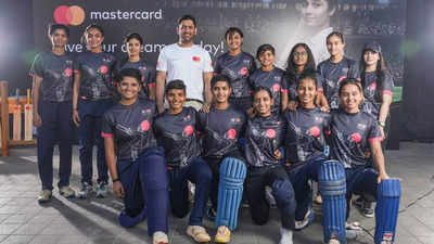 MS Dhoni mentors U-19 women players at a cricket clinic in Mumbai