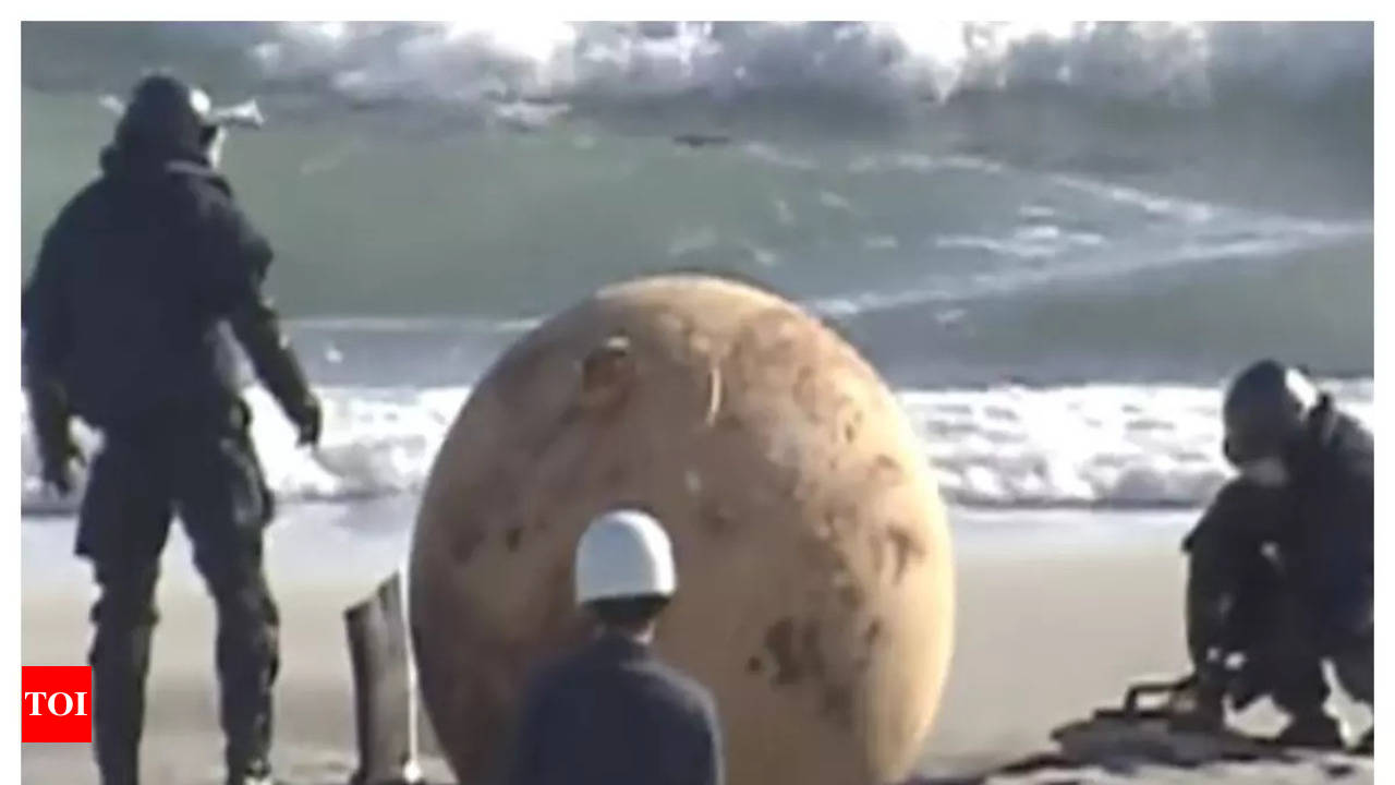 Large mysterious metal ball lands up at a beach in Japan - Times of