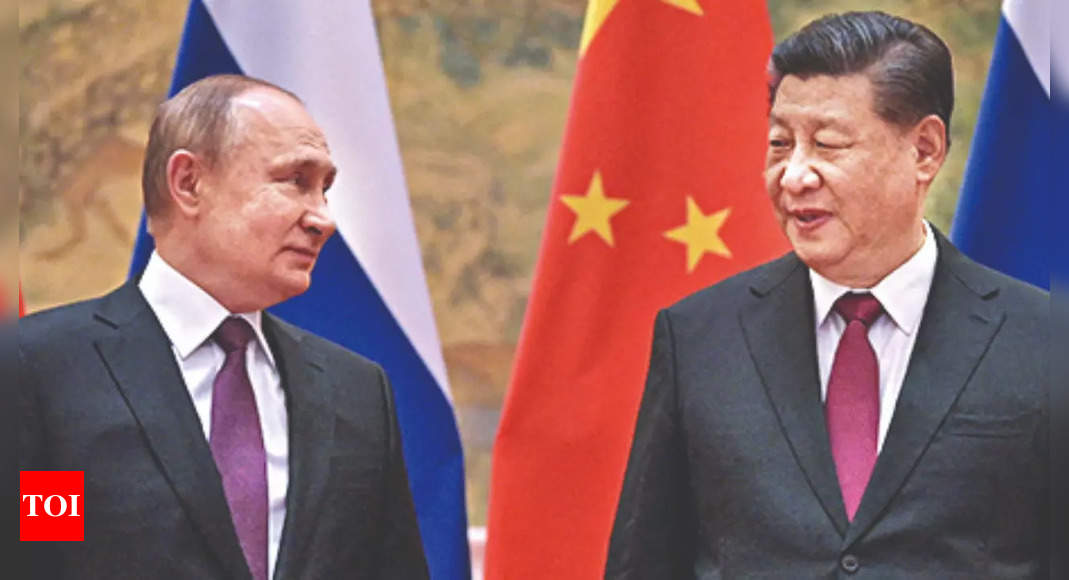 Putin: Putin says Xi to visit Russia, ties reaching ‘new frontiers’ – Times of India