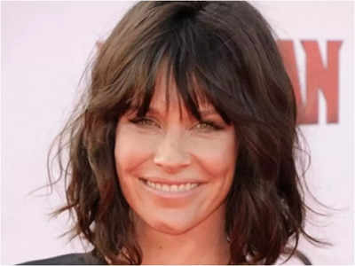 Evangeline Lilly longs to fondle King Charles' ear lobes