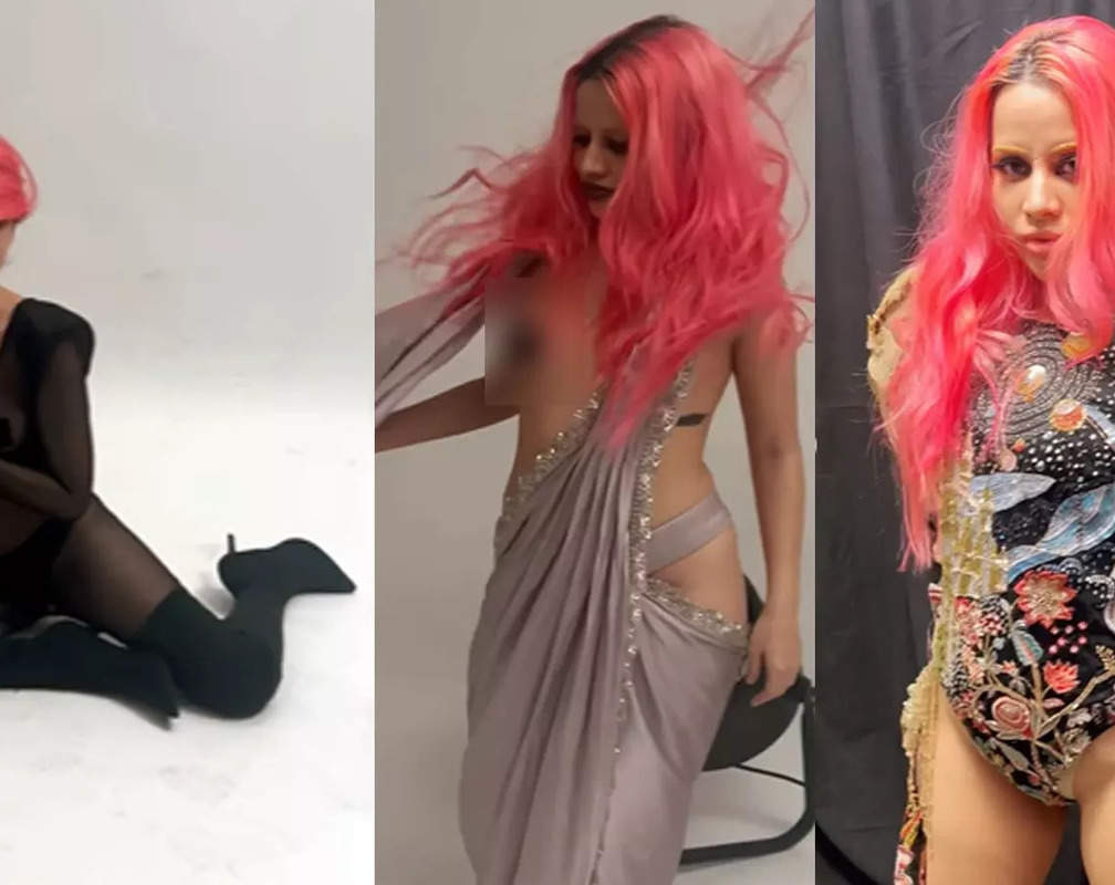 
Urfi Javed flaunts her pink hair and gothic-themed makeup as she poses in different outfits; netizens call her 'nakli Lady Gaga'
