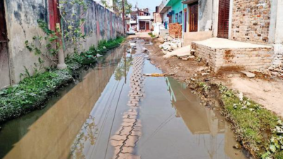 School-bound special kids wade through waterlogged stretch in Lucknow