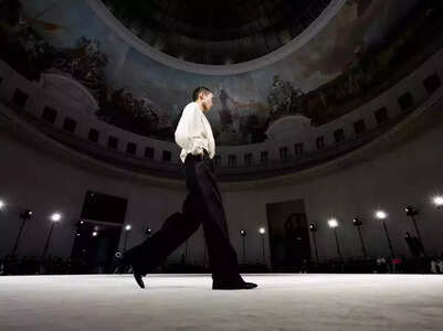 Saint Laurent hits Paris catwalk with broad-shouldered glamour