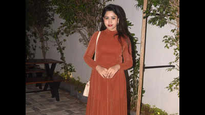 Raycho stood out in her burnt orange attire at the launch of Bistro Graph cafe at Adyar in Chennai