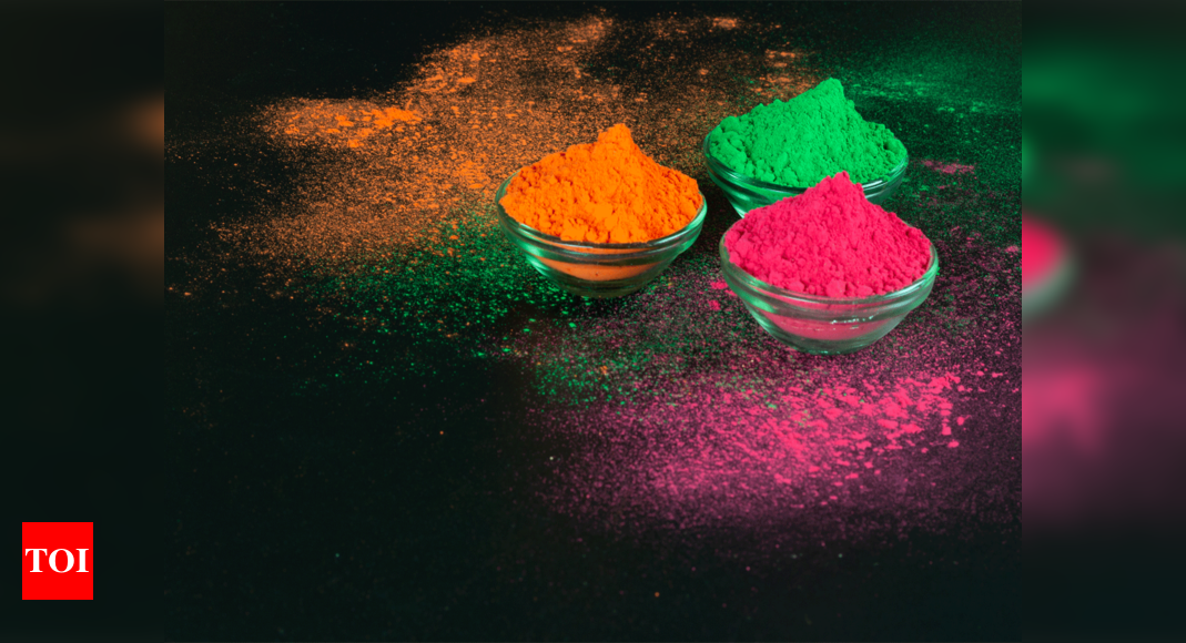 Colorful traditional holi powder in bowls. Happy holi. Concept