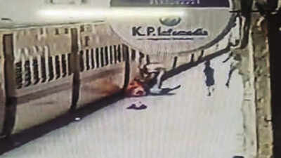 Cop saves woman, child who fell while deboarding moving train in kanpur