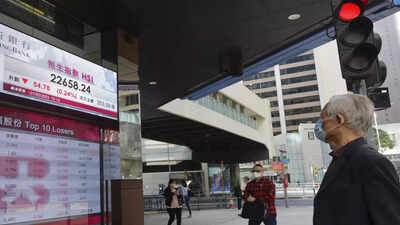 Asia stocks edge up, China sets lower bar on growth