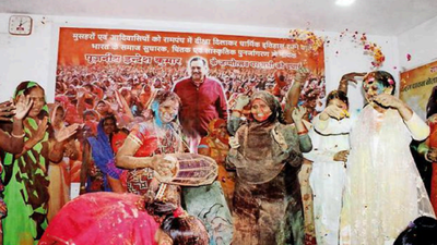 Muslim women smear gulal on each other, celebrate Holi with rose petals in Varanasi