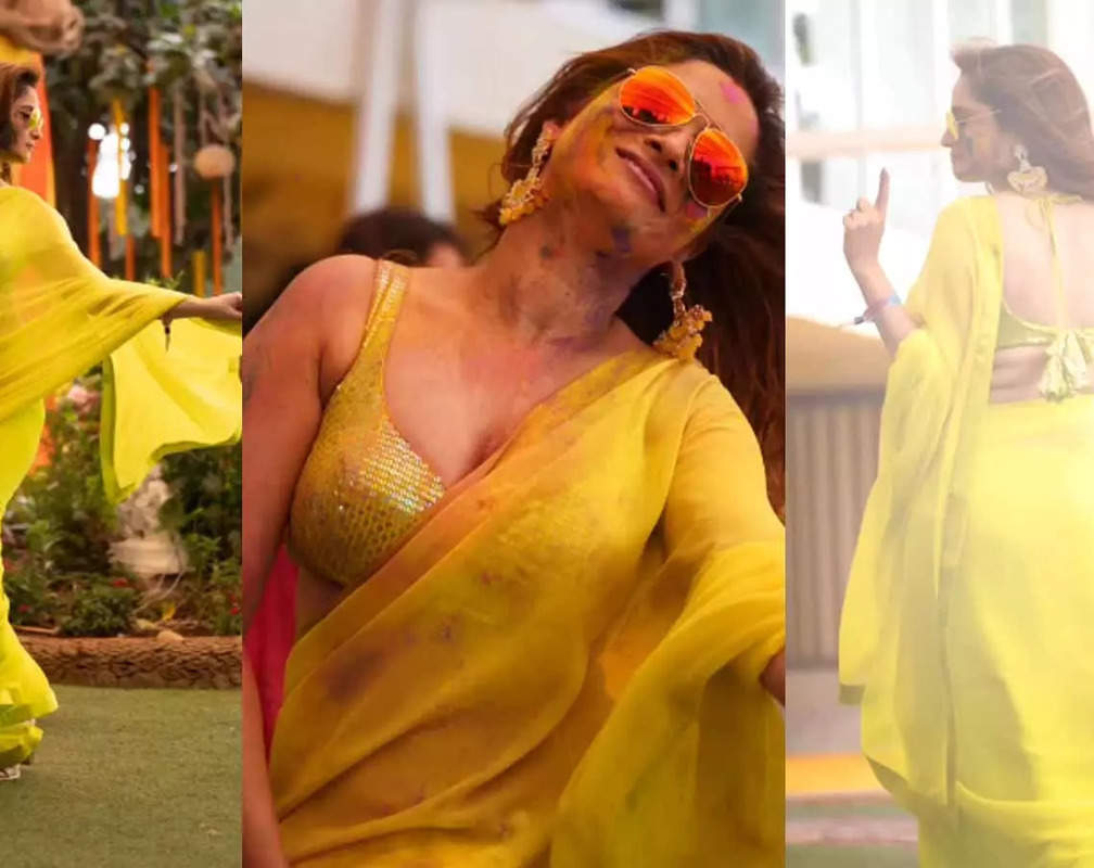 
Ankita Lokhande wears a yellow saree with deep-neck blouse, gets romantic with hubby Vicky Jain at Holi bash
