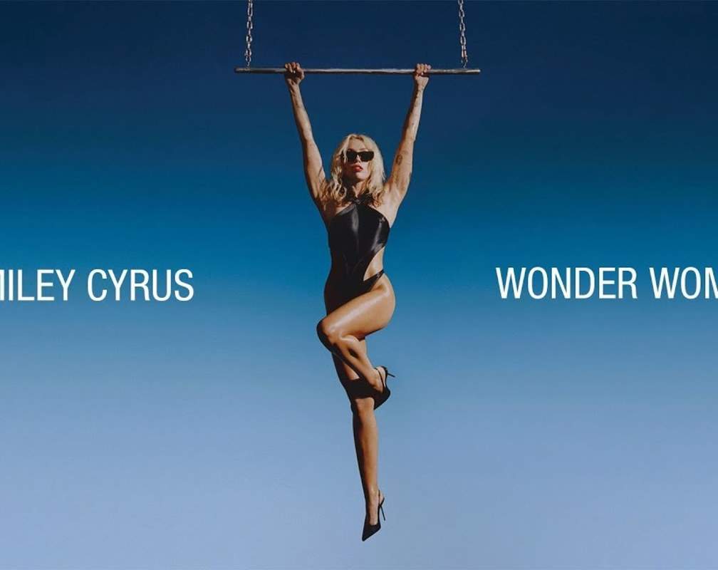 
Listen To Latest English Official Music Audio Song 'Wonder Woman' Sung By Miley Cyrus
