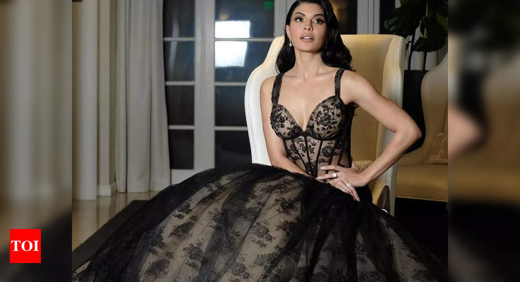 Jacqueline Fernandez makes a stunning appearance in a black net gown at the Academy Award viewing party: Pics inside – Times of India