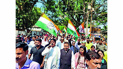 Adani row: Congressmen march to Raj Bhavan seeking parl probe