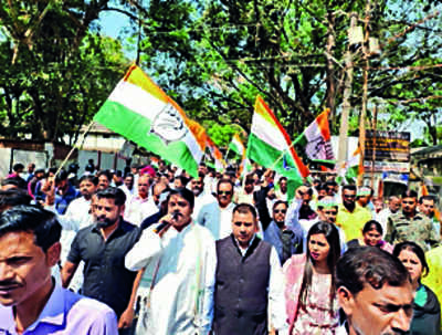 Adani row: Congressmen march to Raj Bhavan seeking parl probe