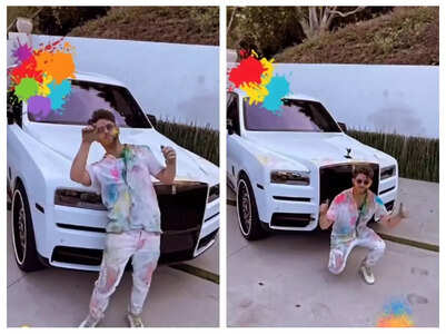 Nick gets Holi colours on white luxury car