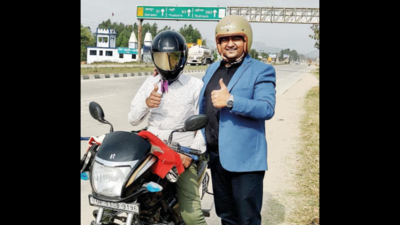 'Helmet Man' goes bankrupt, but will continue his noble ride