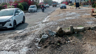 Revamp stuck for 4 yrs, commuters navigate through potholes on Gurgaon's SPR