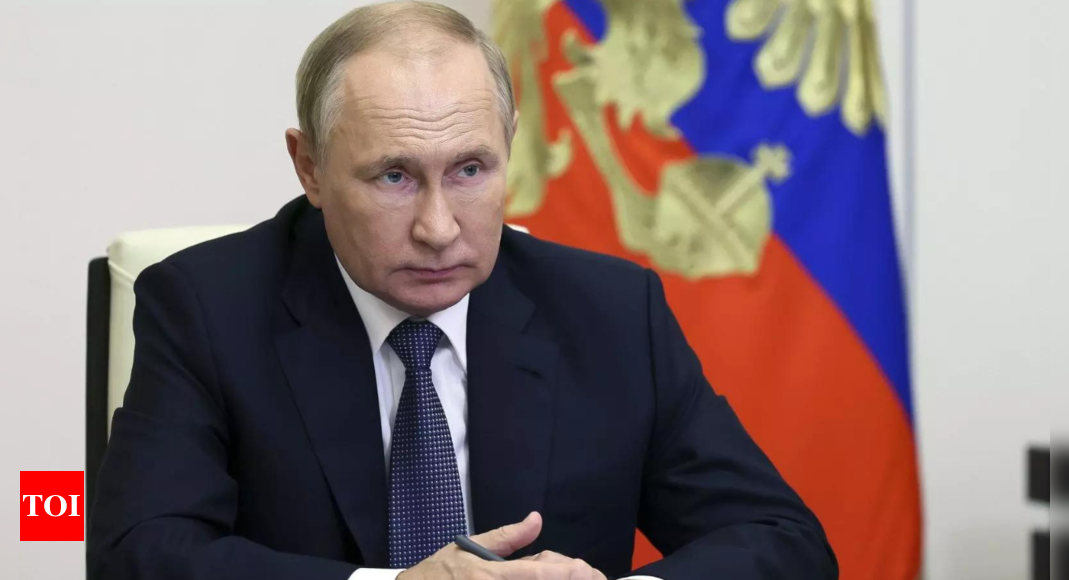 Putin: Putin visits Crimea on anniversary of its annexation from Ukraine – Times of India