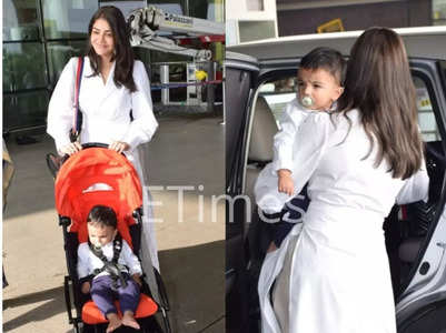 Kajal, son Neil twin in white at the airport