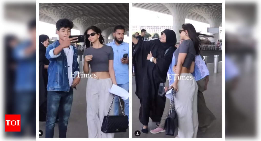 Shah Rukh Khan’s daughter Suhana Khan greets paparazzi; poses for picture with fans at the airport – WATCH video – Times of India