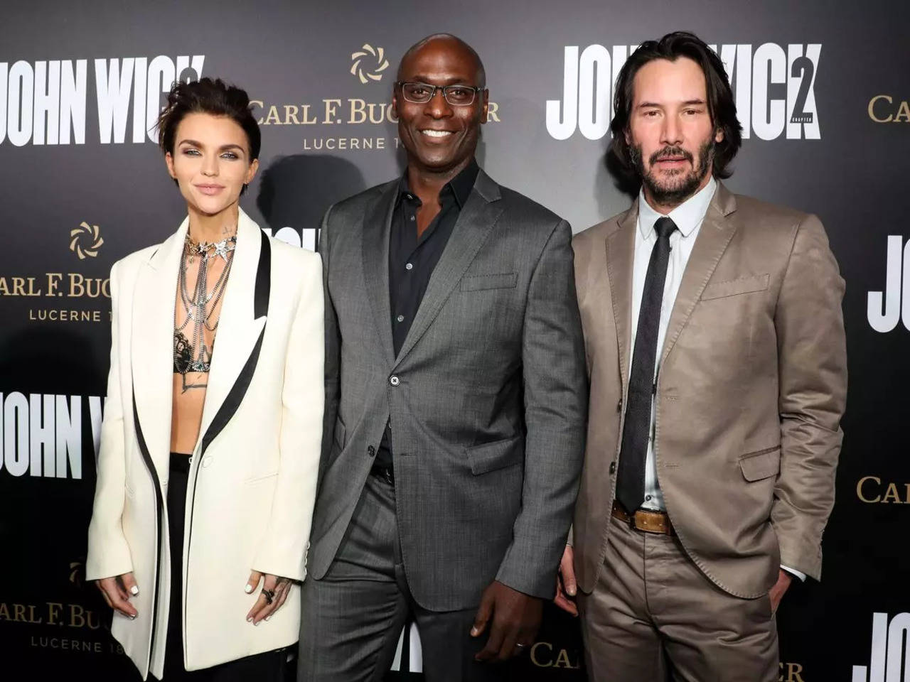 Lance Reddick remembered by Keanu Reeves & more