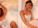 Suhana Khan shares sun-kissed pictures in white halter-neck spaghetti strap dress