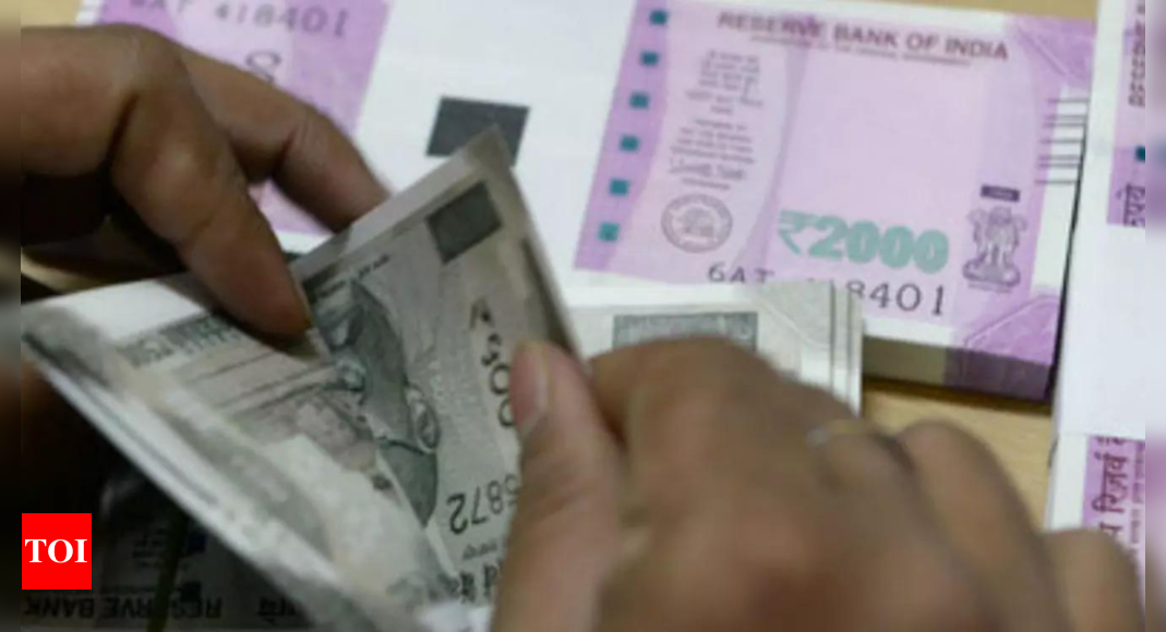 Dollar: Rupee falls 24 paise to close at 82.44 against US dollar – Times of India