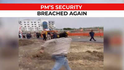 Video emerges of SPG official intercepting mobile phone flung towards PM  Modi during Kochi roadshow (WATCH)