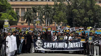 Cong MPs in black clothes throw papers at Chair; Lok Sabha adjourned