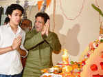 Govinda with his son Yash pray to Lord Ganesh