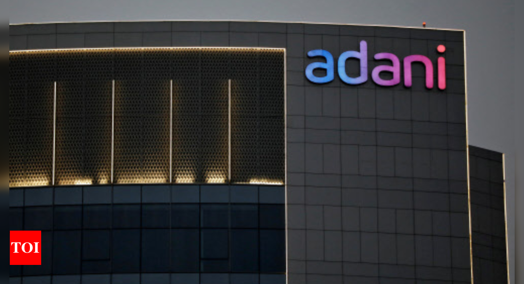 Adani: Adani pins hopes on 20% earnings growth every year to repay  billion debt – Times of India