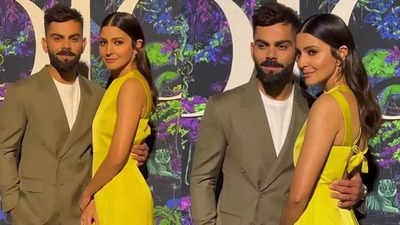 COUPLE ALERT! Anushka Sharma in shiny yellow gown attends an event with hubby Virat Kohli