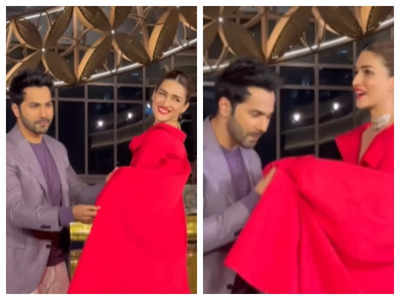 Varun Dhawan's hilariously wipes his face with Kriti Sanon's stunning red outfit; Leaves fans in splits