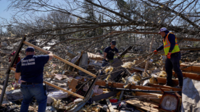 At least 21 dead after tornadoes rake US Midwest, South