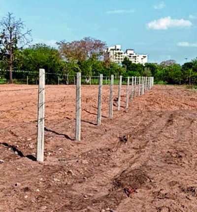 JDA fences unused plot in golf club compound
