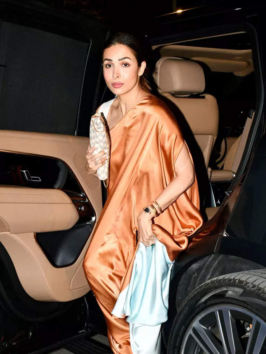 malaika-arora-sets-hearts-racing-in-thigh-high-slit-gown