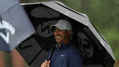Brooks Koepka extends Masters lead before round three suspended due to rain