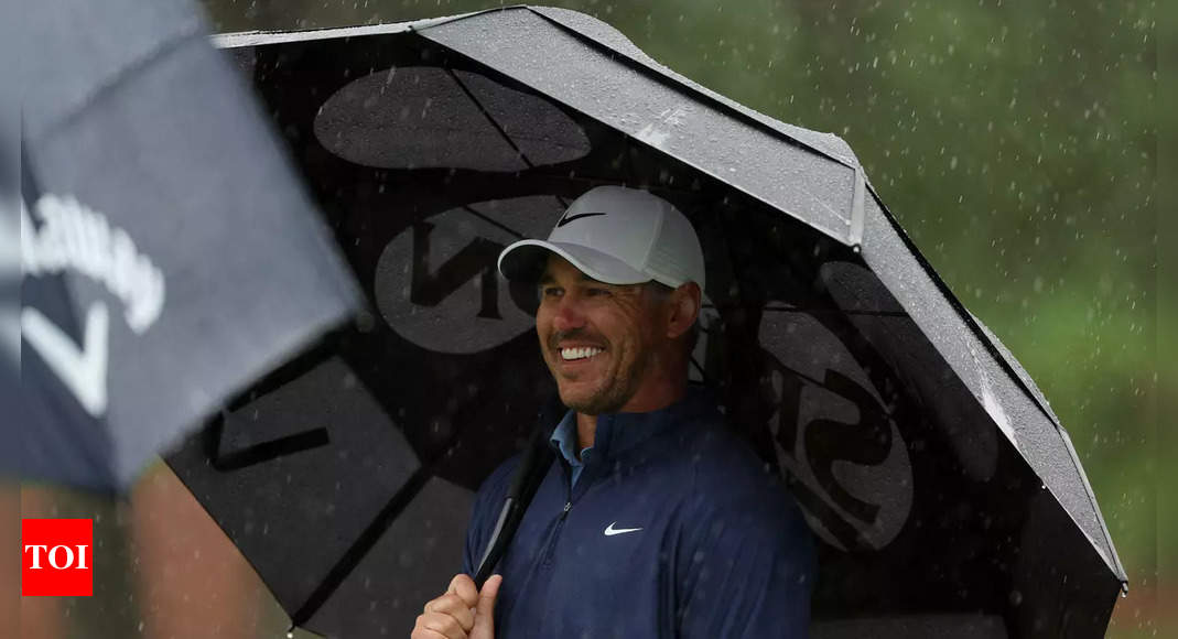 Brooks Koepka extends Masters lead before round three suspended due to rain | Golf News – Times of India