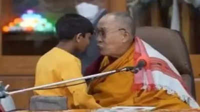 Dalai Lama 'caught on video kissing boy on lips
