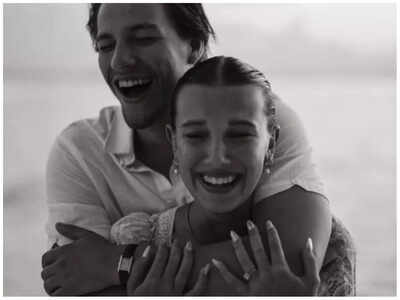 Millie Bobby Brown is ENGAGED! 'Stranger Things' star shows off diamond ring as she gets ready to wed Jake Bongiovi